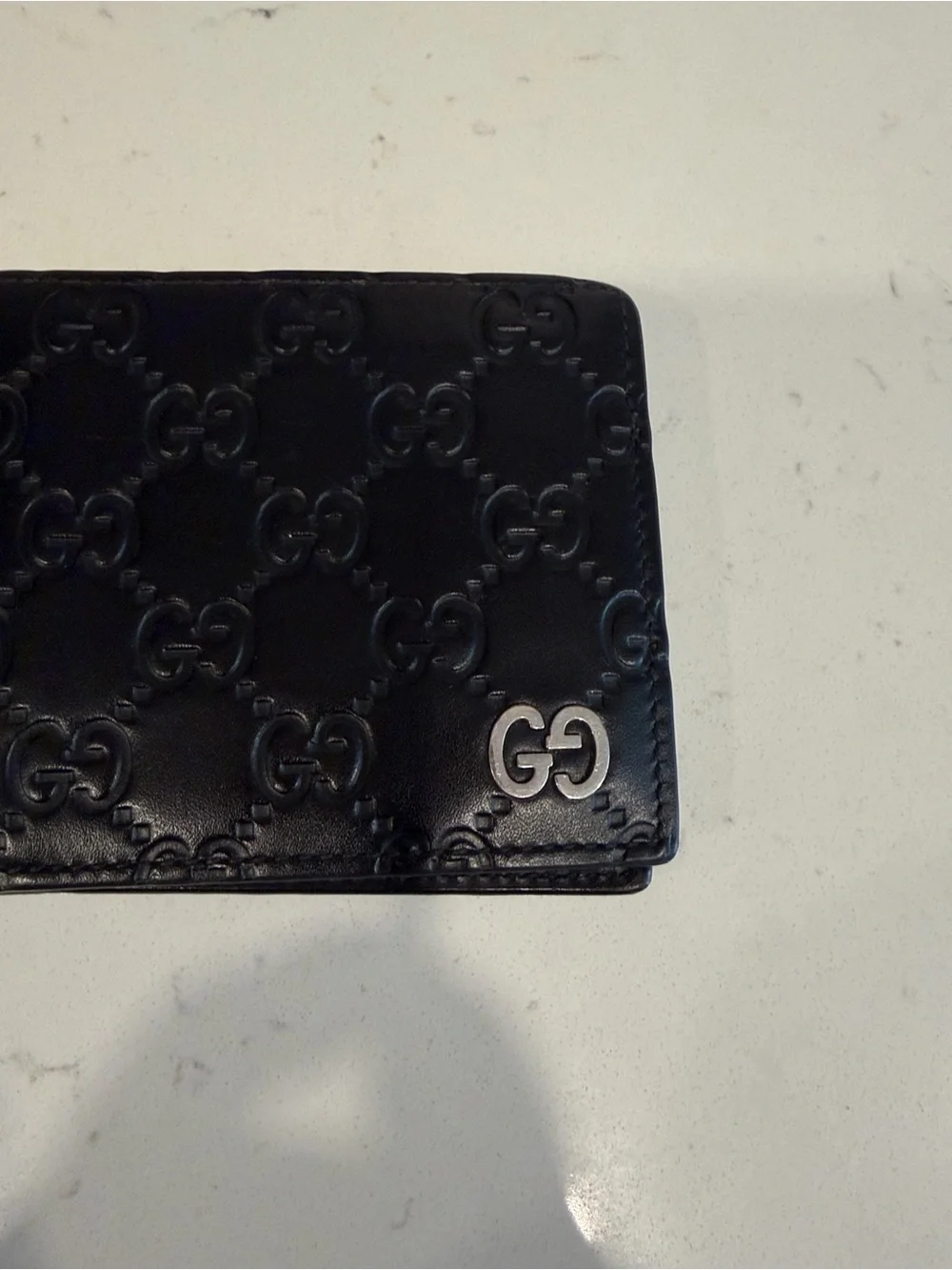 Gucci Black Embossed GG Leather Wallet with Silver-Tone Logo